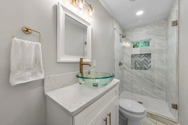 1302 Astor Pl, Austin, TX 78721 - full bathroom featuring vanity, a stall shower, and toilet