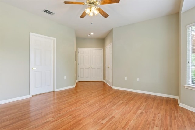 138 Dewberry Dr, Georgetown, TX 78633 - spare room with ceiling fan, light wood-style floors, baseboards, and healthy amount of natural light