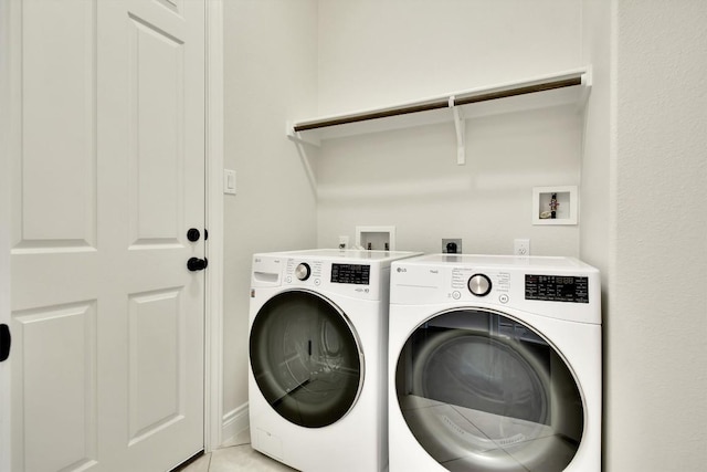 laundry area with washer and clothes dryer