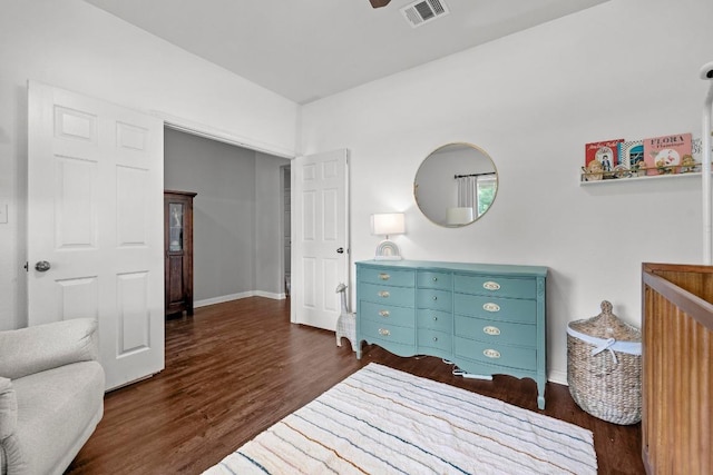 7613 Buck Meadow Dr, Georgetown, TX 78628 - bedroom featuring dark wood-style flooring and baseboards