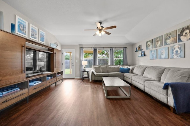 7613 Buck Meadow Dr, Georgetown, TX 78628 - living area with ceiling fan, dark wood-type flooring, and vaulted ceiling