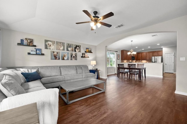 7613 Buck Meadow Dr, Georgetown, TX 78628 - living room with arched walkways, a chandelier, ceiling fan, dark wood-style flooring, and recessed lighting
