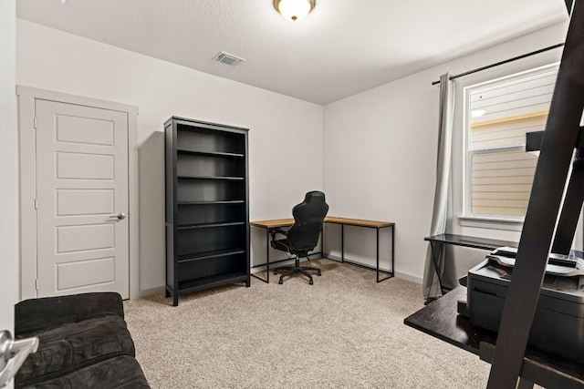 home office featuring carpet floors and baseboards