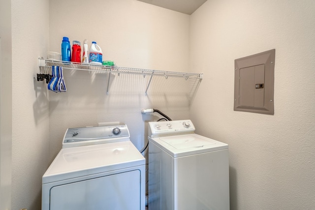 521 E Briarway Dr, Granite Shoals, TX 78654 - laundry room with electric panel and washing machine and clothes dryer