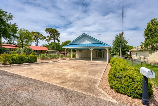 521 E Briarway Dr, Granite Shoals, TX 78654 - view of front of home with concrete driveway and metal roof