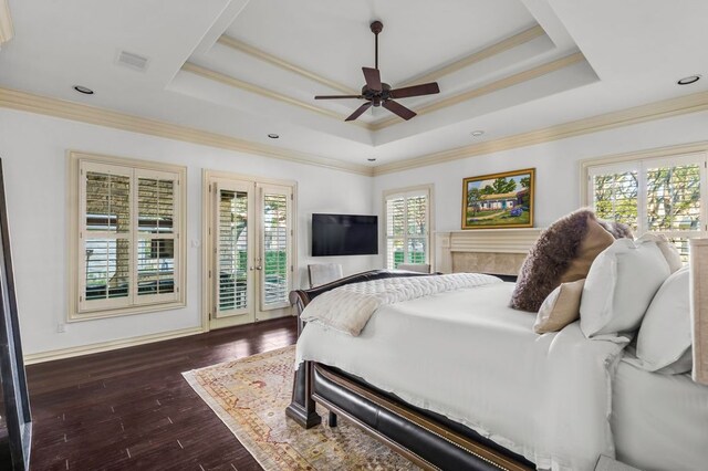 5902 Saratoga Cv, Austin, TX 78746 - bedroom featuring access to outside, ornamental molding, wood-type flooring, a tray ceiling, and ceiling fan