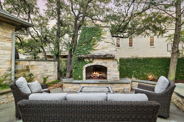 5902 Saratoga Cv, Austin, TX 78746 - view of patio featuring an outdoor living space with a fireplace
