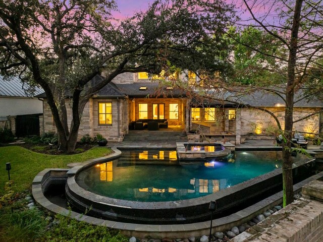 5902 Saratoga Cv, Austin, TX 78746 - view of pool with a pool with connected hot tub and a patio