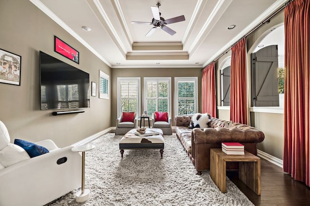 5902 Saratoga Cv, Austin, TX 78746 - living area featuring crown molding, wood finished floors, a ceiling fan, a tray ceiling, and recessed lighting