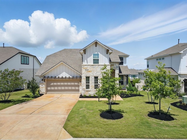 view of front of home featuring board and batten siding, stone siding, driveway, a garage, and a front yard