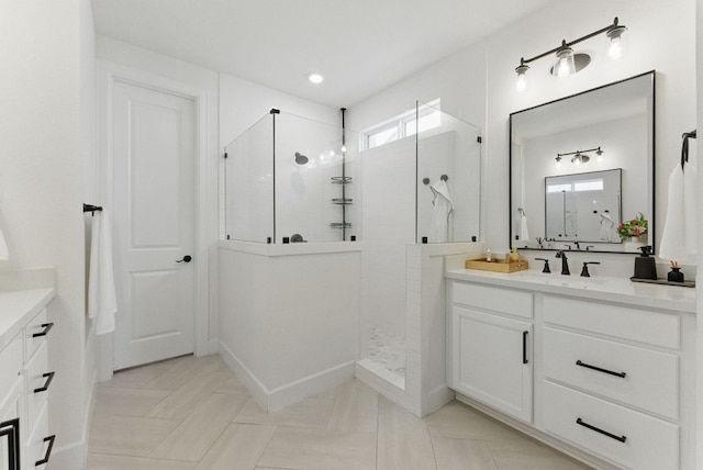 604 Buena Onda Way, Lakeway, TX 78738 - full bath featuring vanity, a walk in shower, and recessed lighting