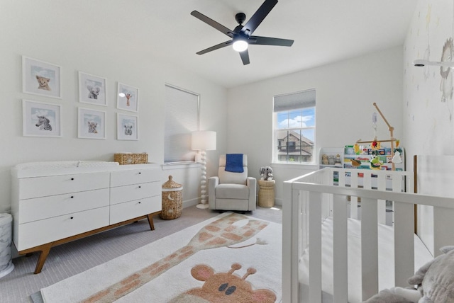 604 Buena Onda Way, Lakeway, TX 78738 - carpeted bedroom featuring a crib and a ceiling fan