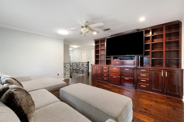 17700 N Rim Dr, Leander, TX 78641 - living area featuring crown molding, dark wood-style floors, a ceiling fan, and recessed lighting