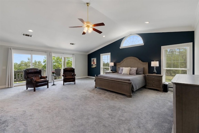 bedroom featuring access to exterior, light colored carpet, multiple windows, lofted ceiling, and ornamental molding