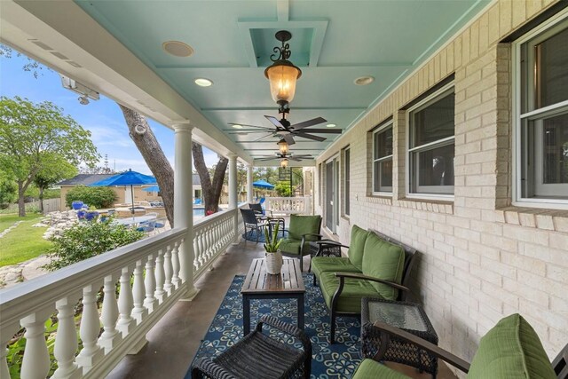 balcony featuring an outdoor hangout area and a porch