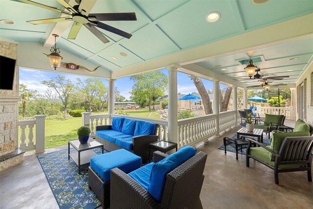 view of patio featuring outdoor lounge area and ceiling fan