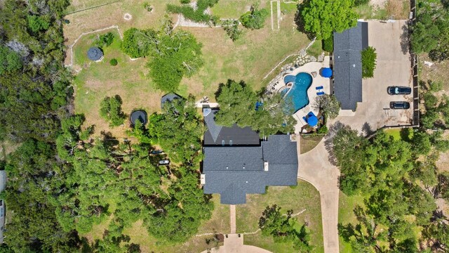 view of property location featuring a pool area