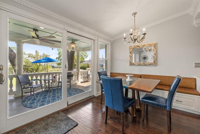 17700 N Rim Dr, Leander, TX 78641 - dining room with hardwood / wood-style flooring, crown molding, a chandelier, and a ceiling fan