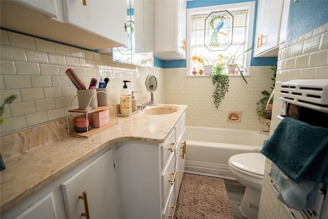 1705 Old Thorndale Rd, Taylor, TX 76574 - bathroom featuring toilet, vanity, and decorative backsplash