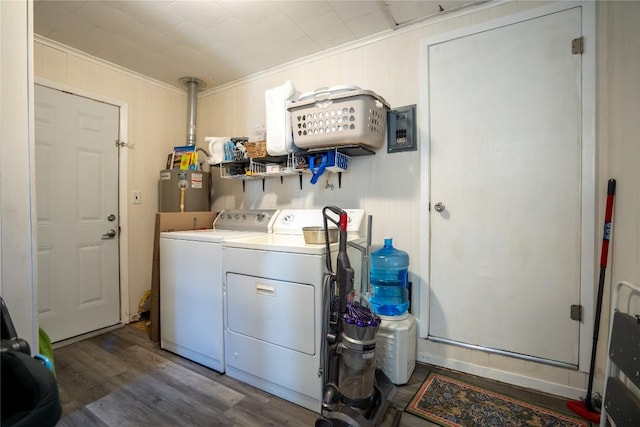 1705 Old Thorndale Rd, Taylor, TX 76574 - laundry room with independent washer and dryer, ornamental molding, and wood finished floors