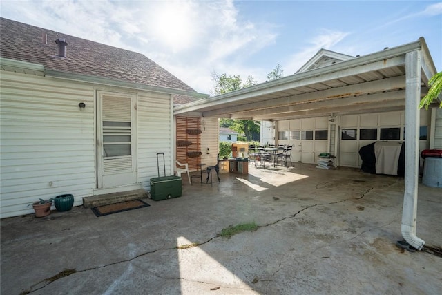 1705 Old Thorndale Rd, Taylor, TX 76574 - view of patio with a garage and outdoor dining area