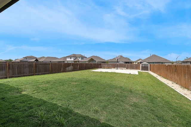 1100 Whipple Tree Trl, Georgetown, TX 78626 - view of yard with a shed, a patio area, an outdoor structure, and a residential view