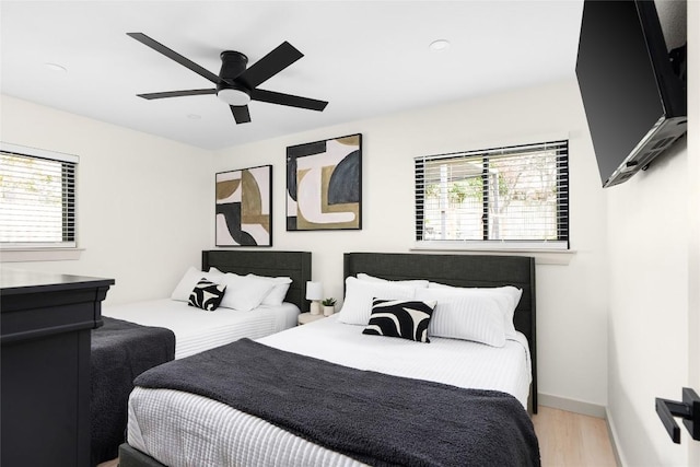 2209 Forest Bend Dr, Austin, TX 78704 - bedroom featuring light wood-style floors, multiple windows, ceiling fan, and recessed lighting