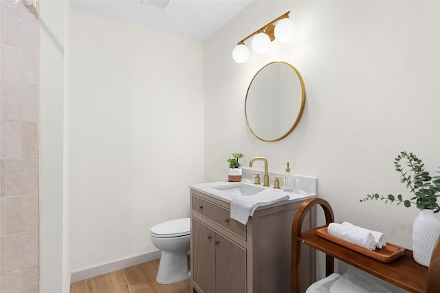 2209 Forest Bend Dr, Austin, TX 78704 - bathroom featuring wood finished floors and vanity