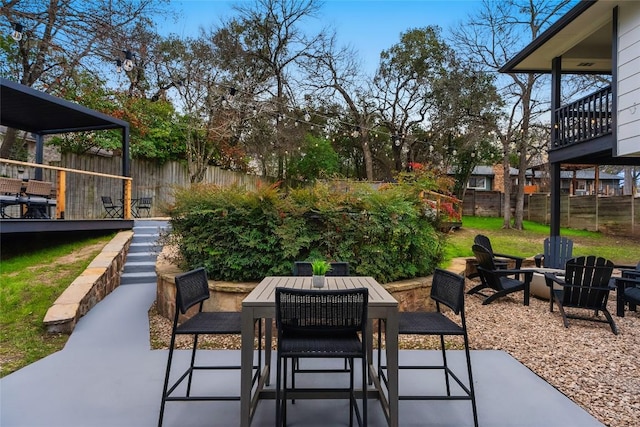 2209 Forest Bend Dr, Austin, TX 78704 - fenced backyard with a patio area, a fire pit, and outdoor dining area