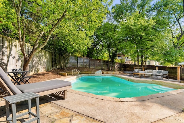 2209 Forest Bend Dr, Austin, TX 78704 - view of swimming pool with an outdoor living space, a patio area, and a fenced backyard