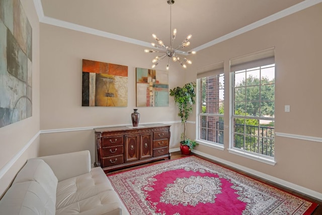 bathroom with a chandelier, ornamental molding, wood finished floors, baseboards, and vanity