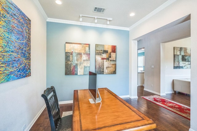dining space with hardwood / wood-style flooring, ornamental molding, recessed lighting, baseboards, and rail lighting