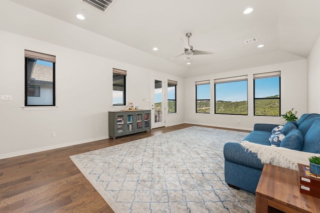 living room with ceiling fan, wood finished floors, baseboards, and recessed lighting