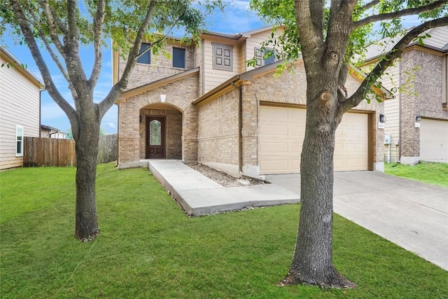 8921 Norwich Castle, Austin, TX 78747 - view of front of home featuring driveway, an attached garage, and brick siding