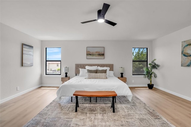 8921 Norwich Castle, Austin, TX 78747 - bedroom featuring light wood-style floors, baseboards, and ceiling fan
