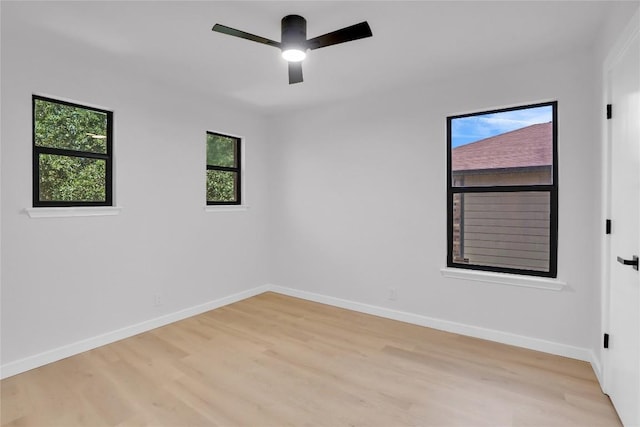 8921 Norwich Castle, Austin, TX 78747 - unfurnished room featuring light wood-style floors, ceiling fan, and baseboards