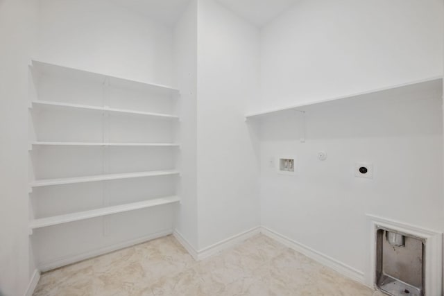 laundry area featuring electric dryer hookup, washer hookup, gas dryer hookup, and baseboards