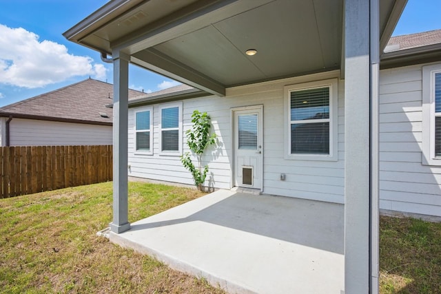 doorway to property featuring a patio