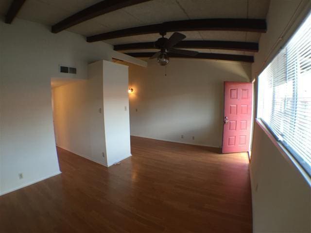2404 Longview St Unit 205, Austin, TX 78705 - spare room featuring ceiling fan, wood finished floors, and baseboards