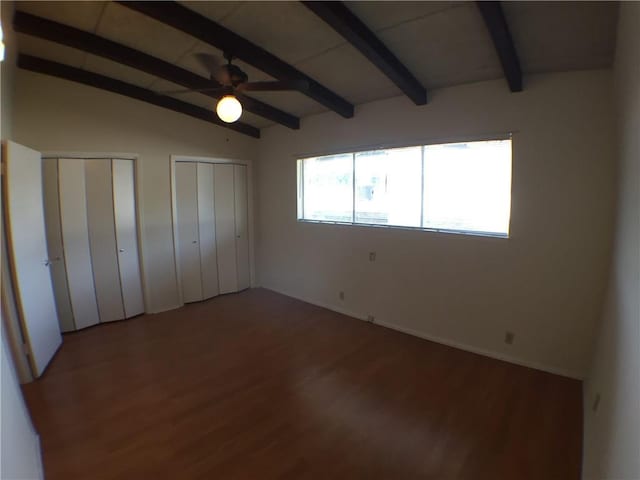 2404 Longview St Unit 205, Austin, TX 78705 - unfurnished bedroom featuring multiple closets and wood finished floors