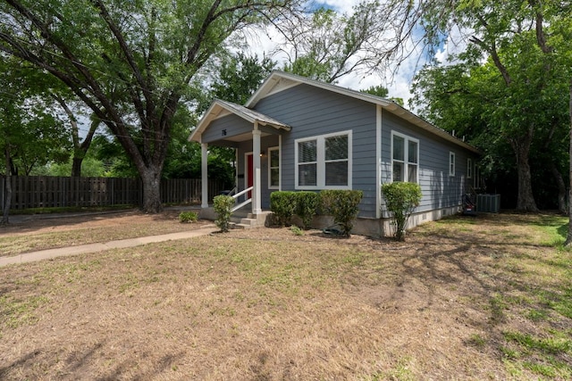 view of front facade featuring central AC unit and covered porch