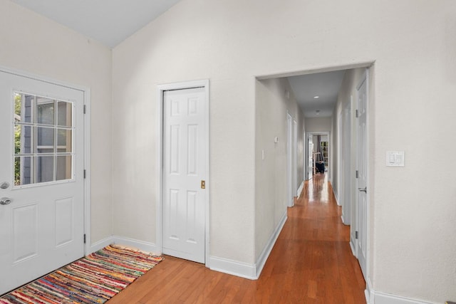 716 W 35th St, Austin, TX 78705 - entrance foyer featuring wood finished floors and vaulted ceiling