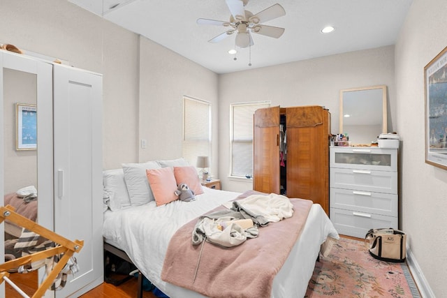 716 W 35th St, Austin, TX 78705 - bedroom with wood finished floors, a ceiling fan, and recessed lighting