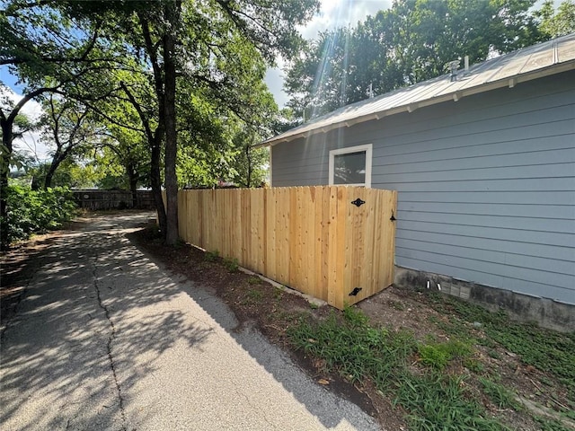 716 W 35th St, Austin, TX 78705 - view of home's exterior with a metal roof