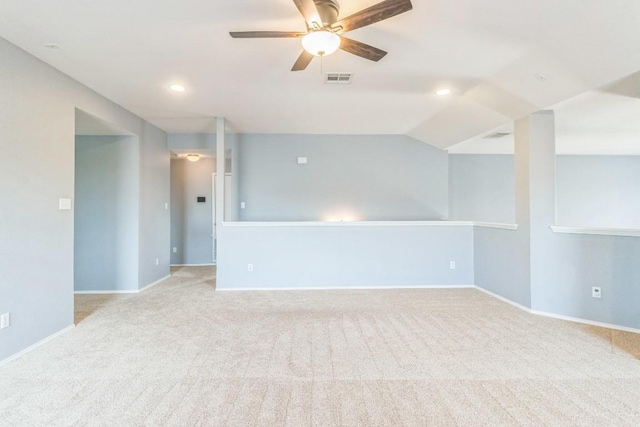 unfurnished room with a ceiling fan, carpet flooring, baseboards, recessed lighting, and lofted ceiling