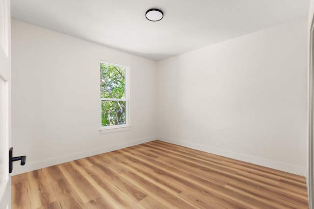 6909 Larue Belle Cv, Austin, TX 78739 - unfurnished room featuring light wood-type flooring and baseboards