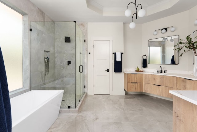 6909 Larue Belle Cv, Austin, TX 78739 - full bath with crown molding, marble finish floors, vanity, a soaking tub, and a stall shower