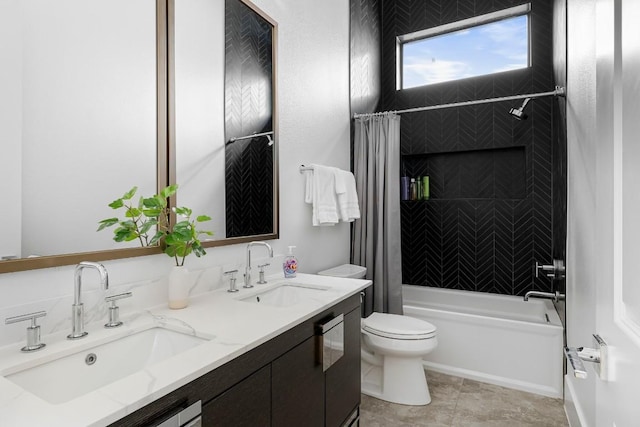 bathroom featuring toilet, shower / tub combo, and double vanity