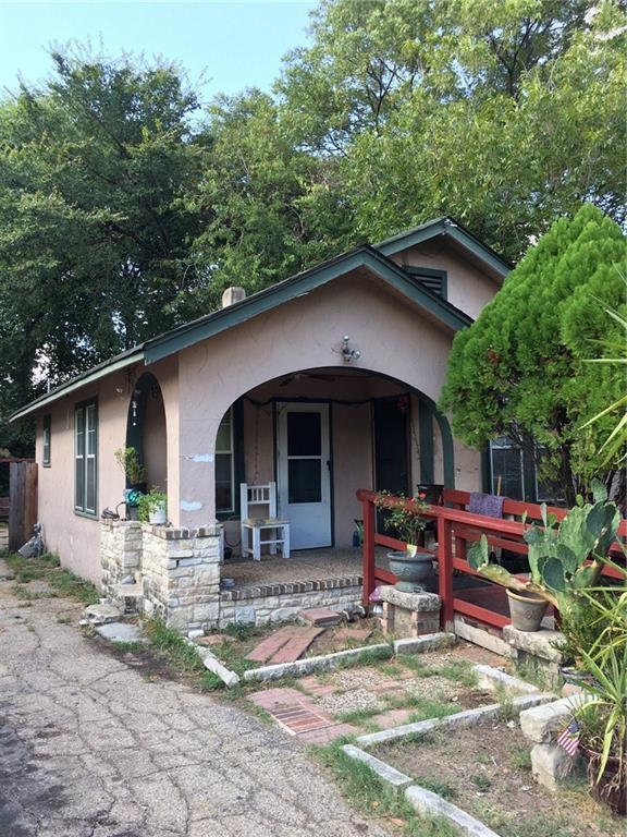 view of front of home with stucco siding and covered porch