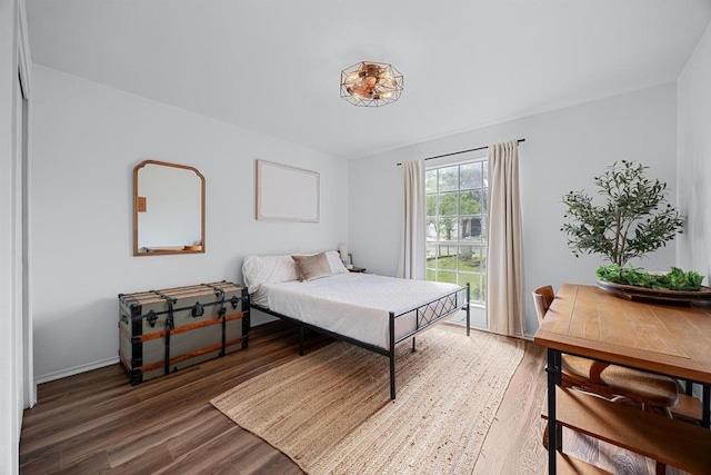 bedroom with wood finished floors